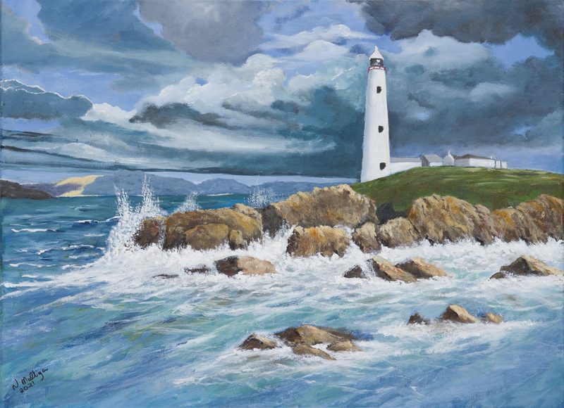 A white lighthouse above a rocky headland with waves breaking below a stormy sky