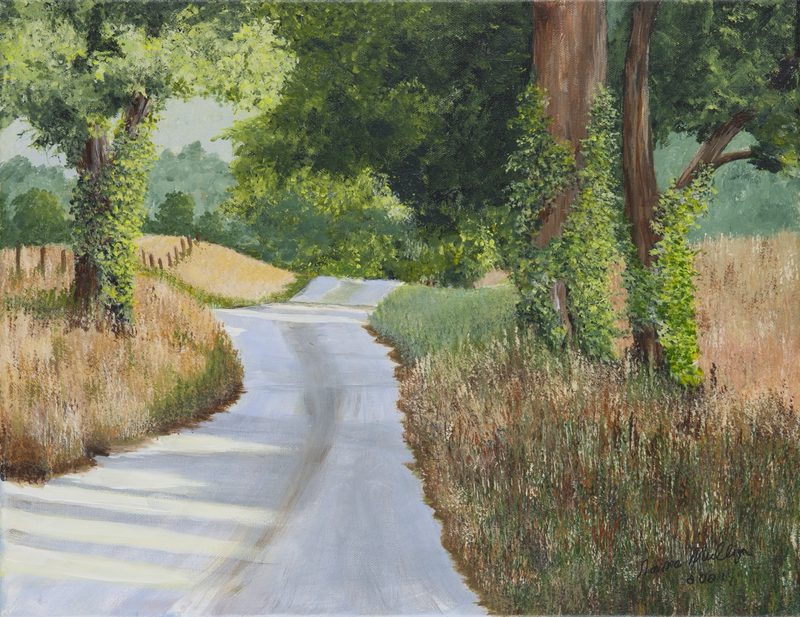 A quiet country road winding between summer trees and golden grasses